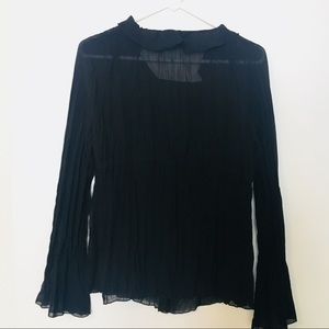Black ruffled blouse